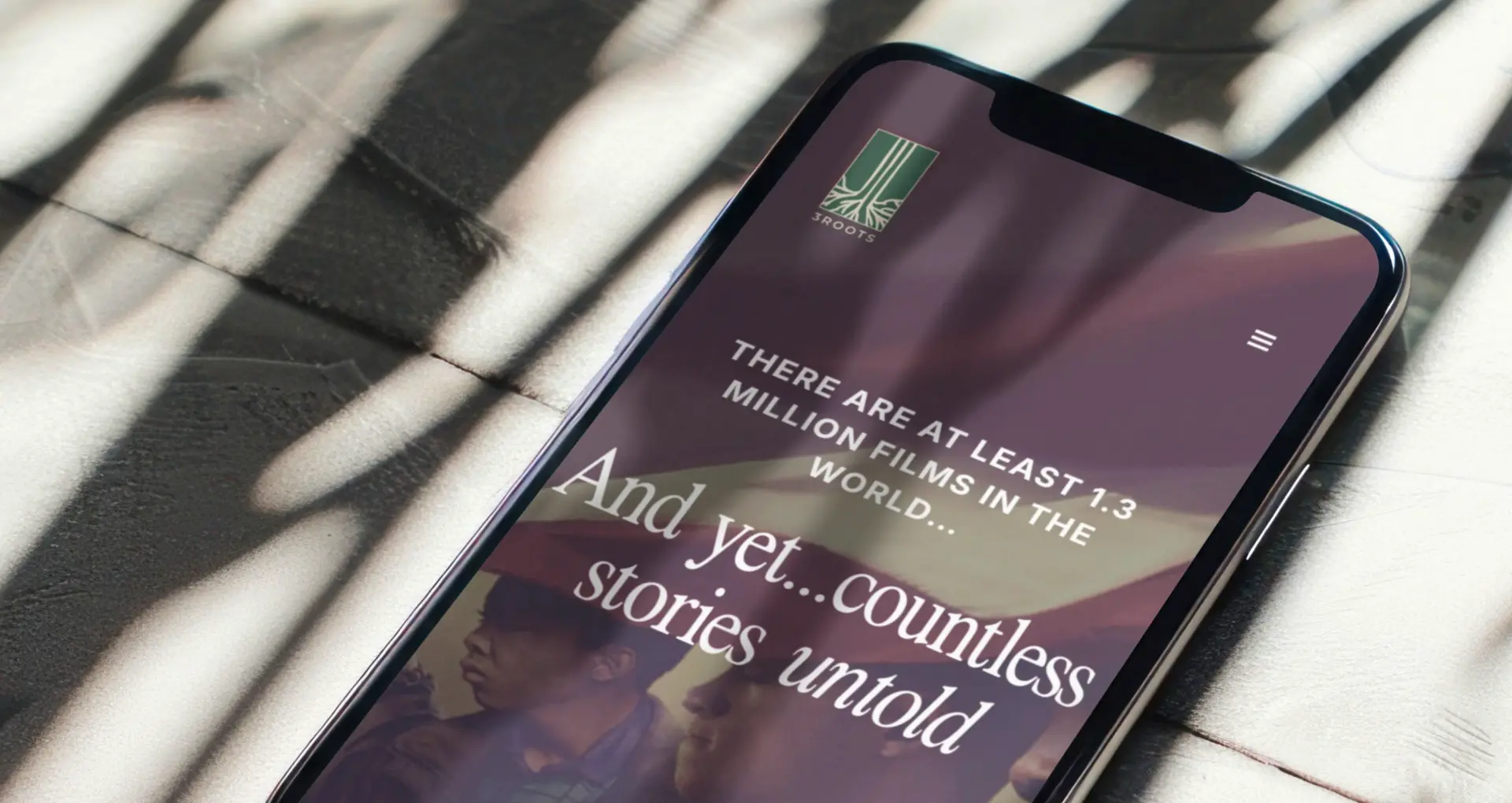 3Roots landing page hero section on a mobile phone.