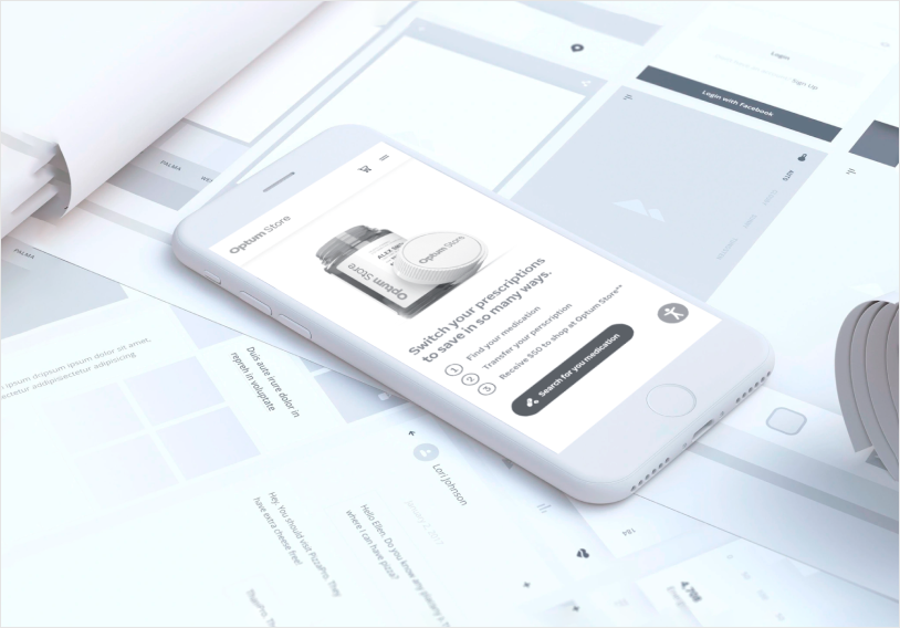 Optum Store mobile pharmacy app mockup resting on a surface scattered with UX wireframes and design drafts.